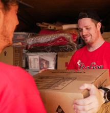 stallion person handing package